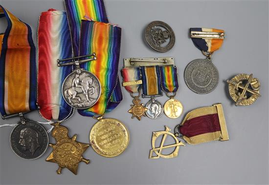 A collection of family medals and other items,